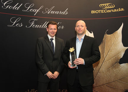Doug Janzen, CEO of Cardiome Pharma, accepts the BIOTECanada Award for 2011 Company of the Year. 