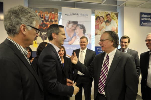 Ontario Premier Dalton McGuinty meets Daniel Carriere, President and CEO of Centric Health, after the company acquired Motion Specialties in February 2012.