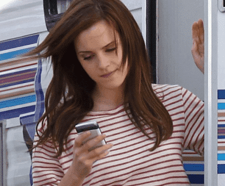 Harry Potter star Emma Watson with her BlackBerry Torch.