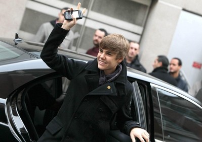 Canadian mega-star Justin Bieber with his BlackBerry Curve. Despite RIM's "late to the party" image on Wall Street, some of the world's biggest, and youngest, celebrities use RIM devices. 