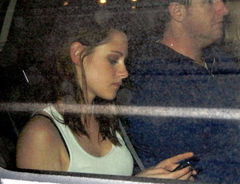 Twilight star Kristen Stewart with her BlackBerry Tour 9630. 