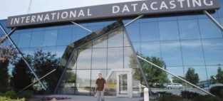 International Datacasting board member Adam Adamou says his strategy has been wrongly characterized as based solely on acquisitions.