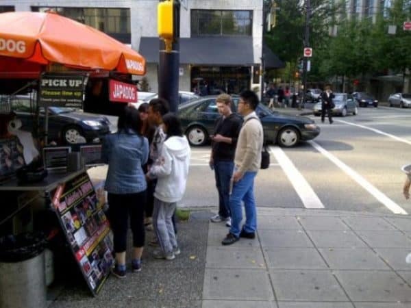 "A hotdog with Teriyaki sauce, mayo and seaweed isn't cool. You know what's cool? A Deep fried pork cutlet marinated in tonkatsu sauce with fresh cabbage." Mark Zuckerberg waits in line at JapaDog last summer in Vancouver.