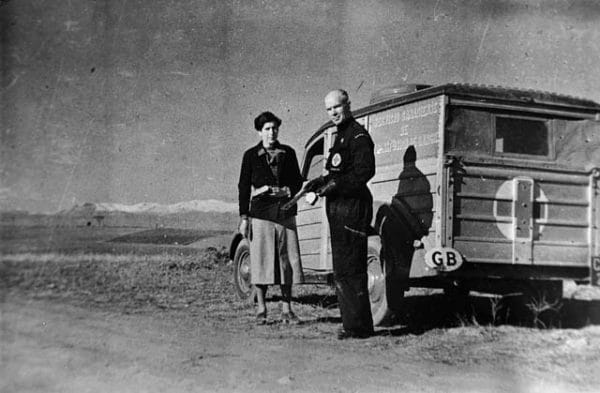 1936: Dr. Norman Bethune stands in front of The Canadian Blood Transfusion Unit which operated during the Spanish Civil War.