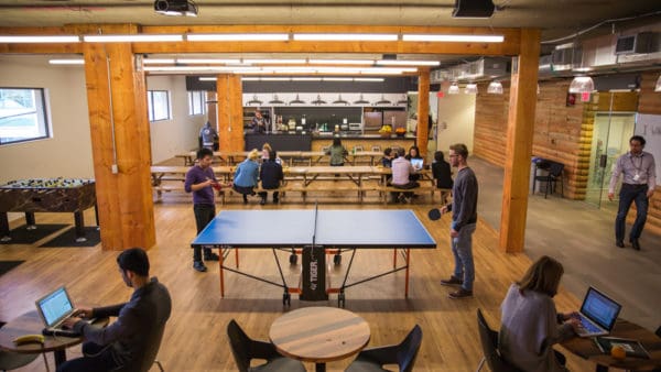 Ping pong and foosball tables are two popular features of the lunch room in HootSuite’s new office.