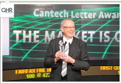 Outgoing QHR CEO Al Hildebrandt shows off his Cantech Letter award for 2013 TSXV Tech Executive of the Year. 