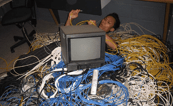 Technician works on a legacy, tethered HMD Source: Macgasm.net